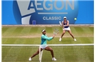 BIRMINGHAM, ENGLAND - JUNE 14:  Raquel Kops-Jones of the USA (front) and Abigail Spears of the USA (back) in action during their doubles semi-final match against Cara Black of Zimbabwe and Sania Mirza of India during day six of the Aegon Classic at Edgbaston Priory Club on June 14, 2014 in Birmingham, England.  (Photo by Jordan Mansfield/Getty Images for Aegon)